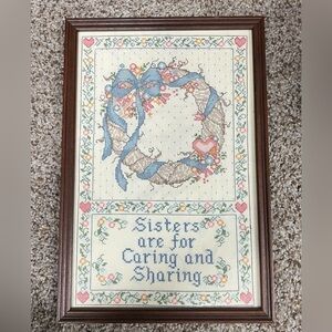 Framed Cross-Stitch Sisters Vintage Wall Art with Blue and Brown Accents